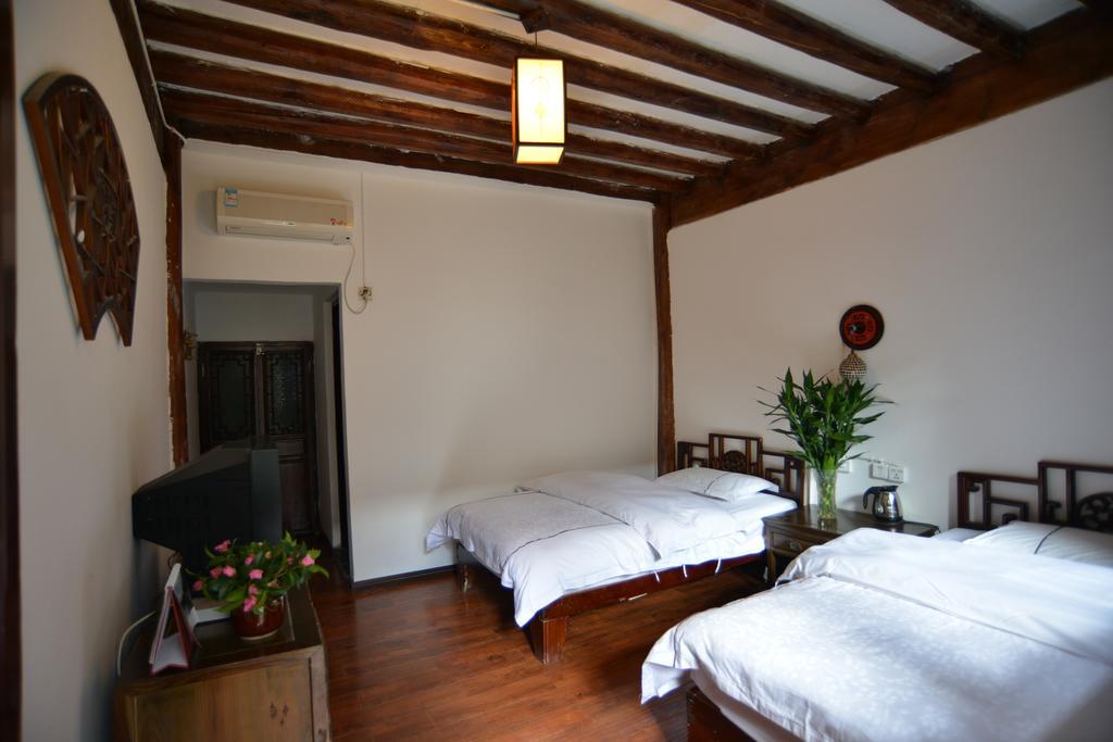 Lijiang Ancient Town International Youth Hostel Zimmer foto
